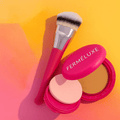 FerméLuxe Peptide Bounce Foundation met Kwast en make-up accessoires op een kleurrijke achtergrond.
